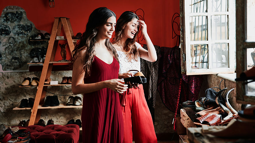 women in shoe store; image used for HSBC LK Premier shopping offer page